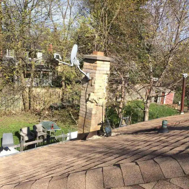 Roof restored after chimney removal in Toronto