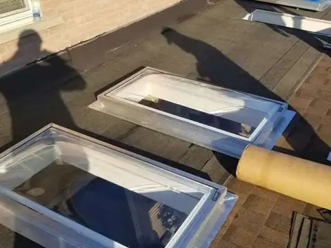 Skylights being installed on a Toronto roof